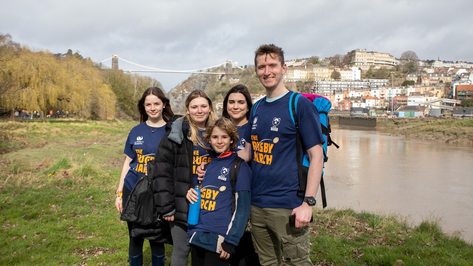 5 family members smiling with Clifton suspension bridge behind them
